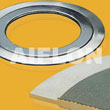 Serrated gasket with loose outer ring